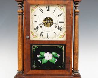 A 19th century Seth Thomas mantel clock.  30-hr weight driven time and strike movement with painted metal dial and Roman numerals.  Mahogany case with a flat top over a single door with clear dial glass and reverse painted lower glass flanked by double turned columns on a simple plinth base.  Paper label 50% intact.  Older refinishing with some wear, restored dial and lower glass, needs cable, not running when cataloged.  25 3/4" high.  ESTIMATE $100-150