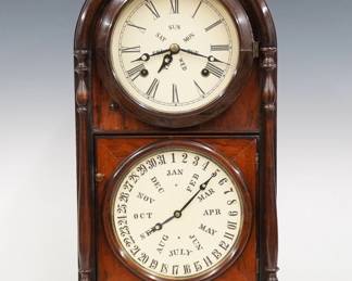 A late 19th century Welch, Spring & Co. Italian No. 1 Model shelf clock.  8-day time and strike movement with upper day of the week and lower calendar mechanism indicating date and month, papered metal dials with Roman/Arabic numerals.  Rosewood case with an arched top above two doors with circular dial glasses flanked by turned pilasters on a molded base.  Interior paper label 80% intact.  Refinished with minor wear, re-papered dials, running when cataloged.  19 1/2" high.  ESTIMATE $100-200
