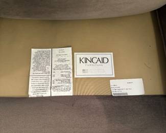 Tags attached under cushion