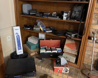 Vintage entertainment corner, 45’s, cameras, VHS, etc. 