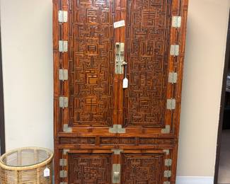 Antique Asian stacking cabinet, solid wood, featuring detailed carvings and brass hardware, unusual 36'x75"