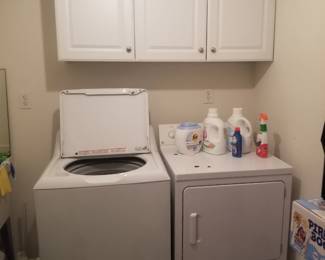 Washing machine; dryer; laundry room cabinets