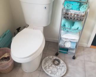 Toilet; rolling storage tower; scale