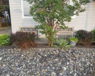 Gravel; park benches; trees & plants