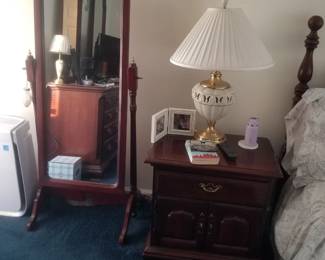 Nightstand; table lamp; standing floor mirror