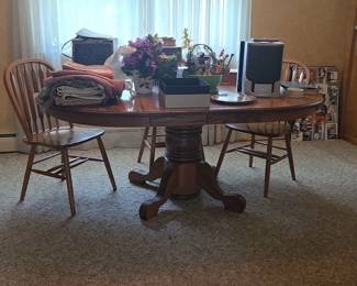 Four spindle back chairs