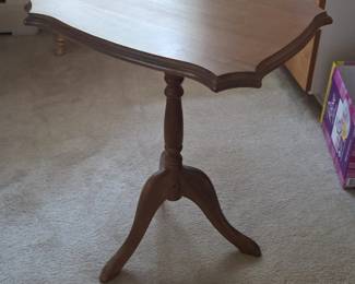 Tilt top candle stand