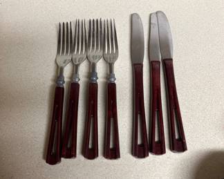 MCM flatware, four forks and three knives