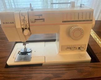 Close-up of singer, sewing machine
