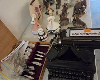 Vintage typewriter and silverware 