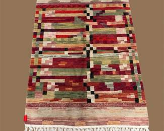 Authentic handwoven Kilim with colorful striped patterns and artisan craftsmanship. A wonderful addition to bohemian, rustic, or contemporary homes.