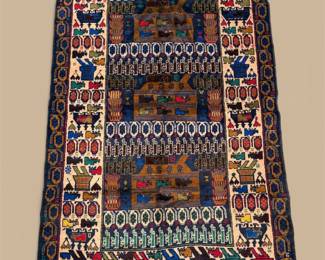 Handwoven tribal rug with intricate geometric motifs and rich, earthy colors. A timeless statement piece that brings warmth and character to any home.