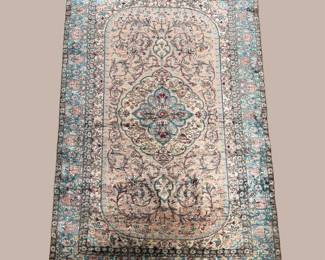 Elegant antique-style rug with a softly aged finish and finely detailed border work. A versatile piece that blends effortlessly into both classic and modern homes.