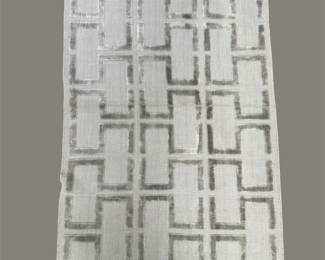 Contemporary neutral rug featuring a refined geometric pattern that adds subtle texture and visual interest without overwhelming the space.