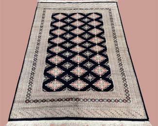 Modern geometric rug with a bold black-and-ivory lattice pattern. A clean, stylish choice for contemporary and minimalist interiors.