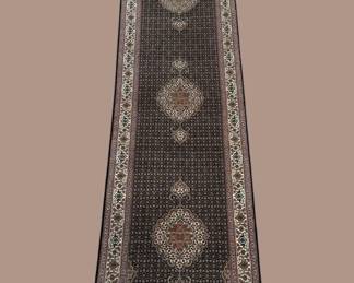 Dark-toned runner featuring elegant medallion motifs and refined border details. Ideal for adding warmth to hallways, foyers, or entryways.
