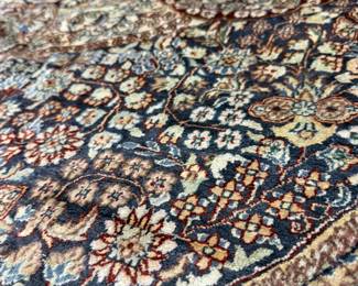 Thousands of carefully tied knots create extraordinary depth, texture, and detail throughout this heirloom-quality handmade rug.