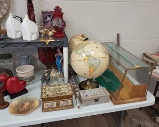 Globes, glass display case