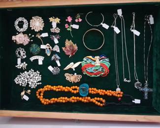 various brooches.  Some silver