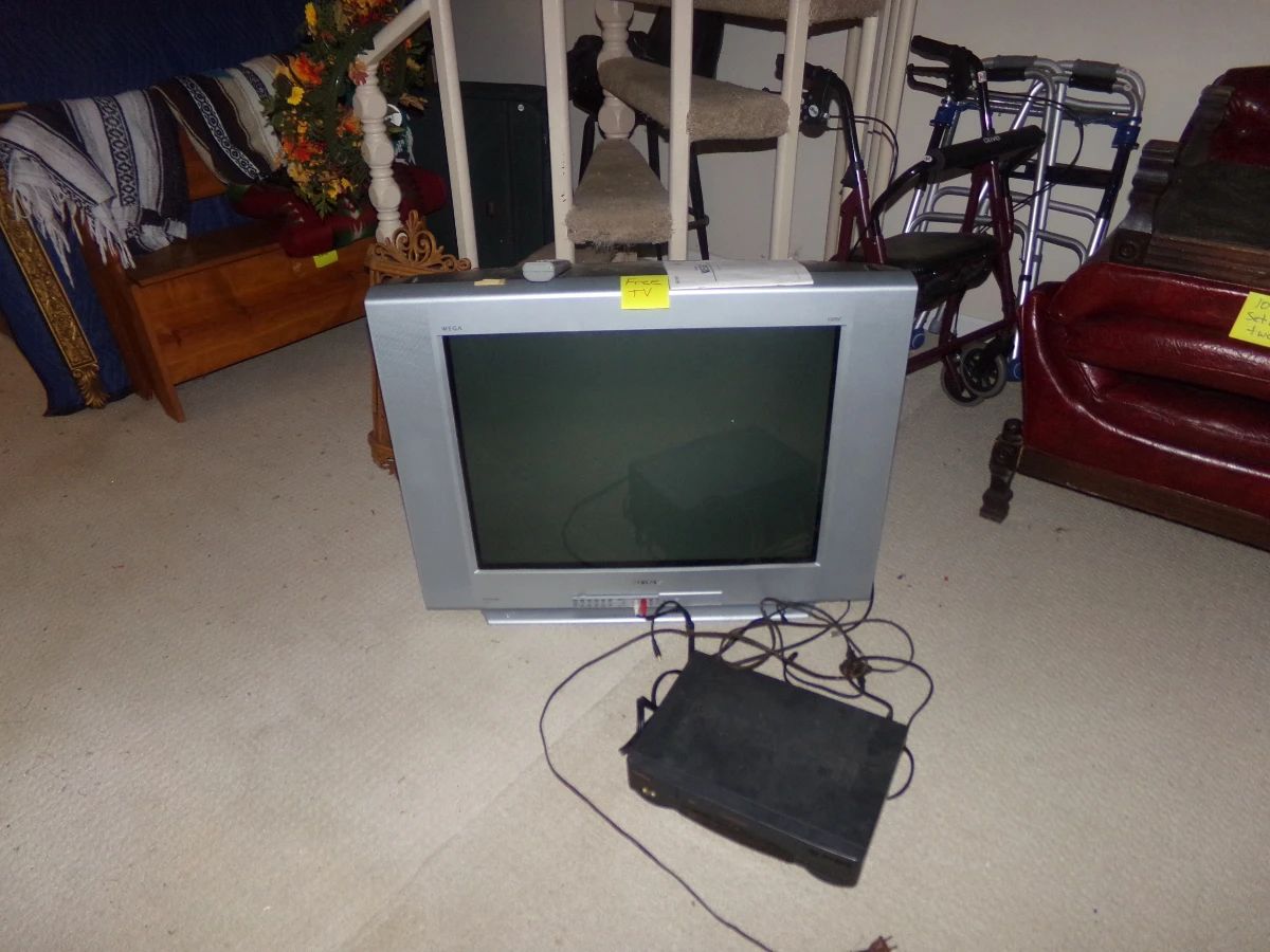 200 pound sony Trinitron Bring help . Its downstairs . 