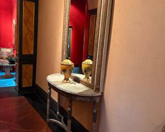 Italian Neoclassical style painted and giltwood console table and mirror set