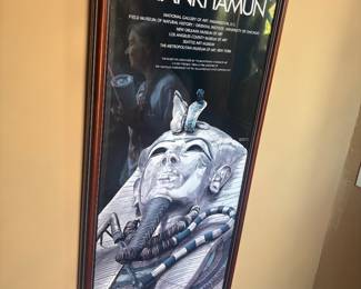 Framed Tut poster under glass