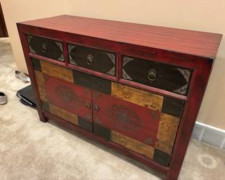 Cherry colored side table, 48” wide x 18” deep x 34” high