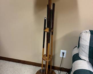Rare floor lamp with 4 vintage irons with wood shafts. This is for the golfer who thinks that they have everything.
