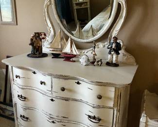 Wood dresser plus mirror. Dresser is 44” x 21” x 34” high. Mirror is 43” wide x 40” high.