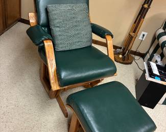 Green leather glider and foot stool by Glider Motion.