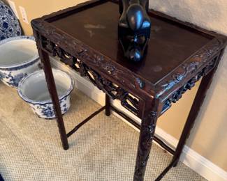 Small carved wooden table