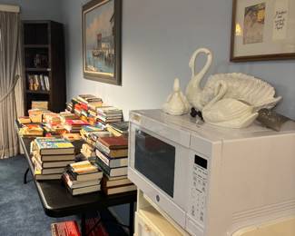 Microwave, cabinet,& books