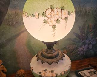 We toted this gone with the wind style lamp to several  of our sales to try to gain some admiration for this style beautiful condition $300 all original