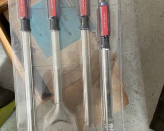 New-in-package Craftsman 4-piece barbecue accessory set, including spatula, fork, tongs and grill-cleaning brush.