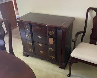 Mahogany buffet server with drawers and fold-out top. Matches the dining table, chairs and china cabinet.