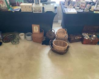 Assorted decorative and storage baskets, picnic baskets, planters, framed décor and sewing supplies in wooden storage boxes.