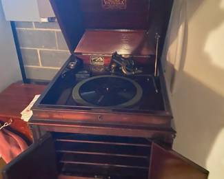 Original Victor Talking Machine Company Victrola cabinet phonograph, likely Model VV-XI, produced in Camden, New Jersey, circa 1910–1921. The VV-XI was Victor’s most successful floor-model Victrola, with the horn concealed inside the mahogany cabinet. Includes a collection of 78 RPM records.  This one will be priced very attractively for the estate sale.  The exact model and year can be confirmed from the small metal identification plate beside the turntable.