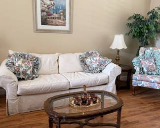 Rowe Slipcover Sofa, Vintage Oval Coffee Table, Art