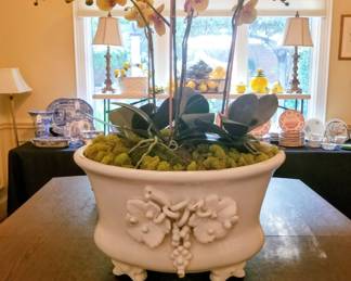 Silk orchids in large ceramic centerpiece bowl