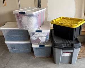 Storage Totes Filled with Assorted Christmas Lights and Other Decorations