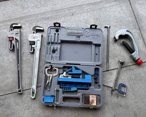 Assorted Plumbing Tools and Adjustable Wrenches