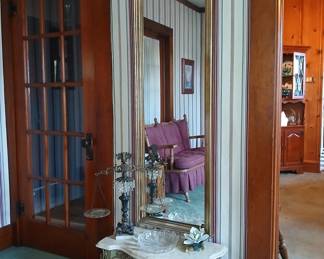 Gold finish mirror and table