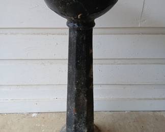 This old water drinking fountain pedestal once stood at the old Henderson County Courthouse