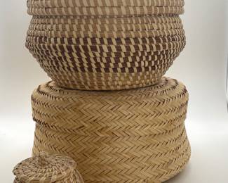 Handwoven baskets with artists' information
