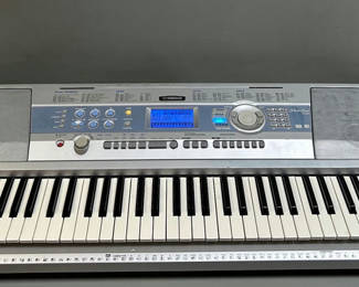 Lot 43: Yamaha DGX-200 76 Key Portable Digital Piano