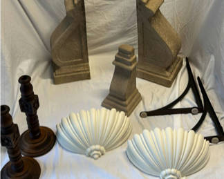 Lot 83: Assorted decorative home items: candlesticks, pedestals, brackets, and shell decor