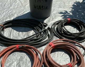 Lot 106: Irrigation hoses, fittings, timer, and yard waste bin