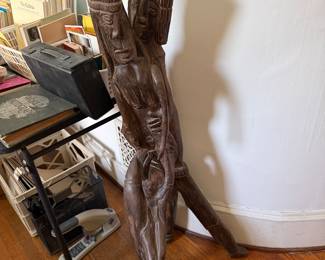 Library-artist C. Dahua carved statue from Iquitos, Peru