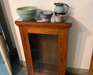 Dining Room-Display case, pottery pieces