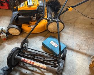 Garage- Cub cadet mower, manual mower